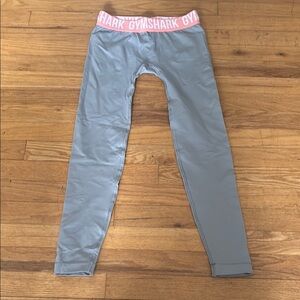 Gym shark size small grey leggings with pink band. Perfect condition. Worn once.